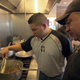 Sahul Flores, left, at one of the restaurants he oversees